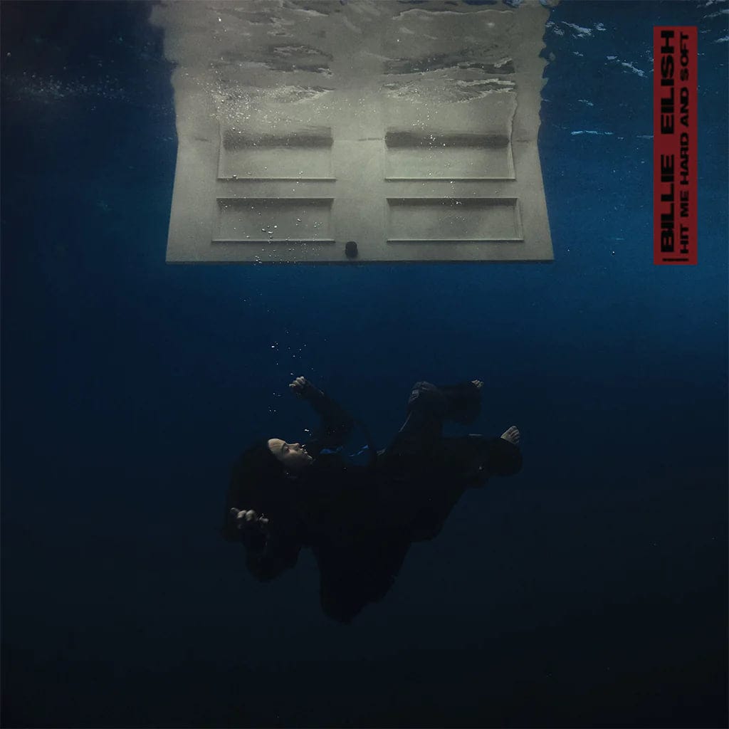 Album cover with billie eilish underwater looking up at a door, with a red label on the top right corner.